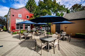 Poolside BBQs with Covered Seating at Apartments Near Tanasbourne
